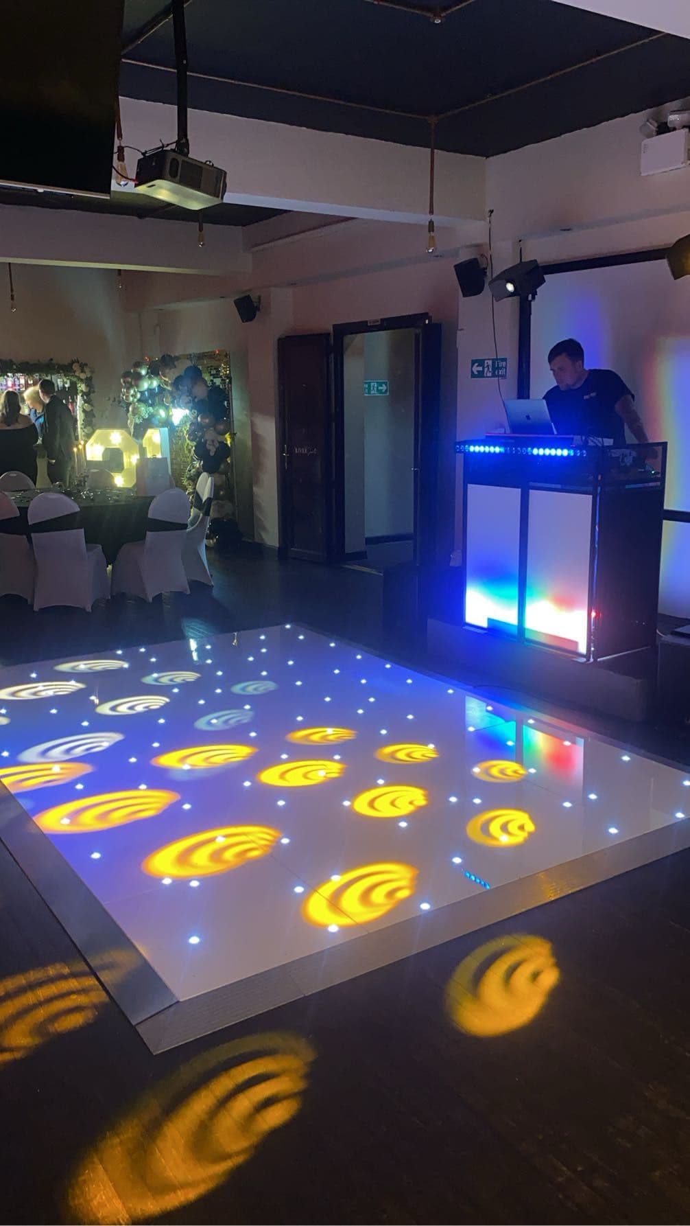 Starlit dancefloor and DJ booth