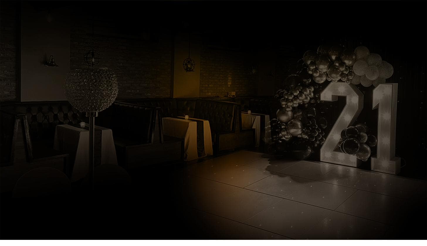 Themed party setup at Gracy's with saloon banner across the private bar